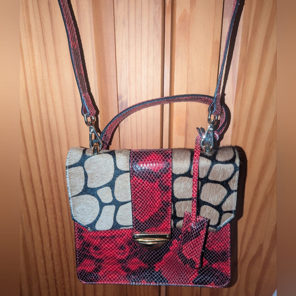 Vittoria Napoli Sinner Leather And Calf Hair Handbag.